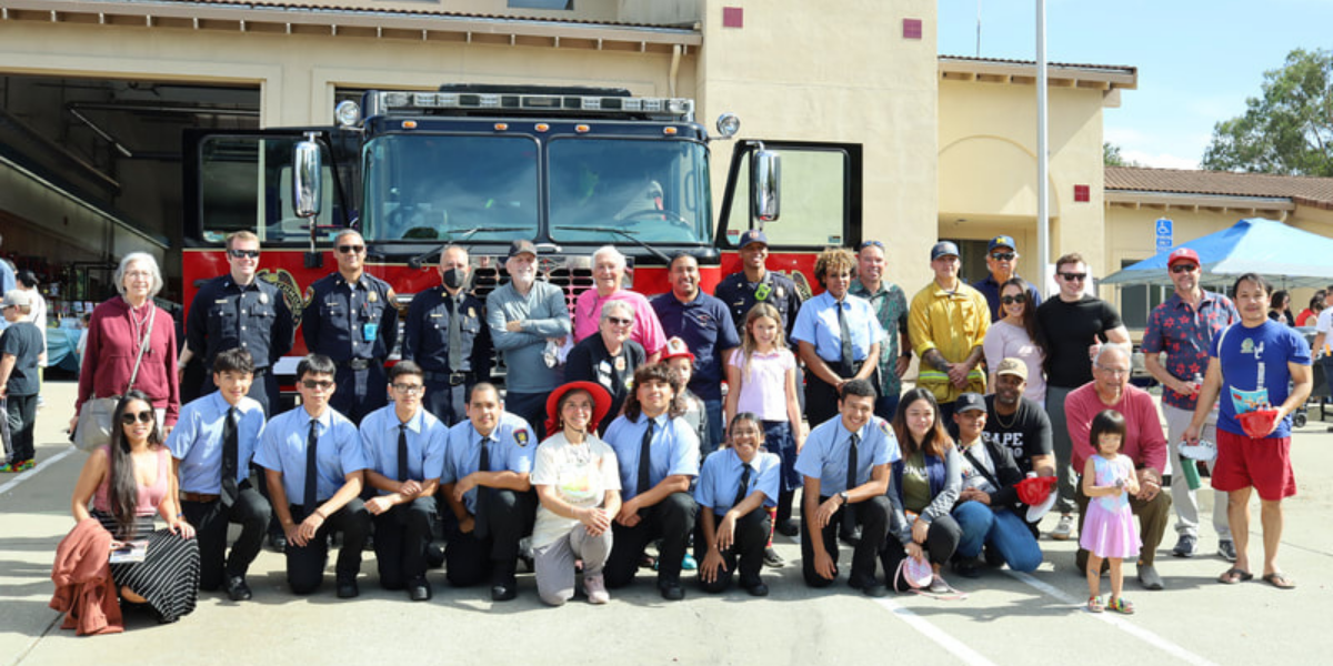 fire station 63 open house big group in front of fire truck officials and families WCCFSC 20250118